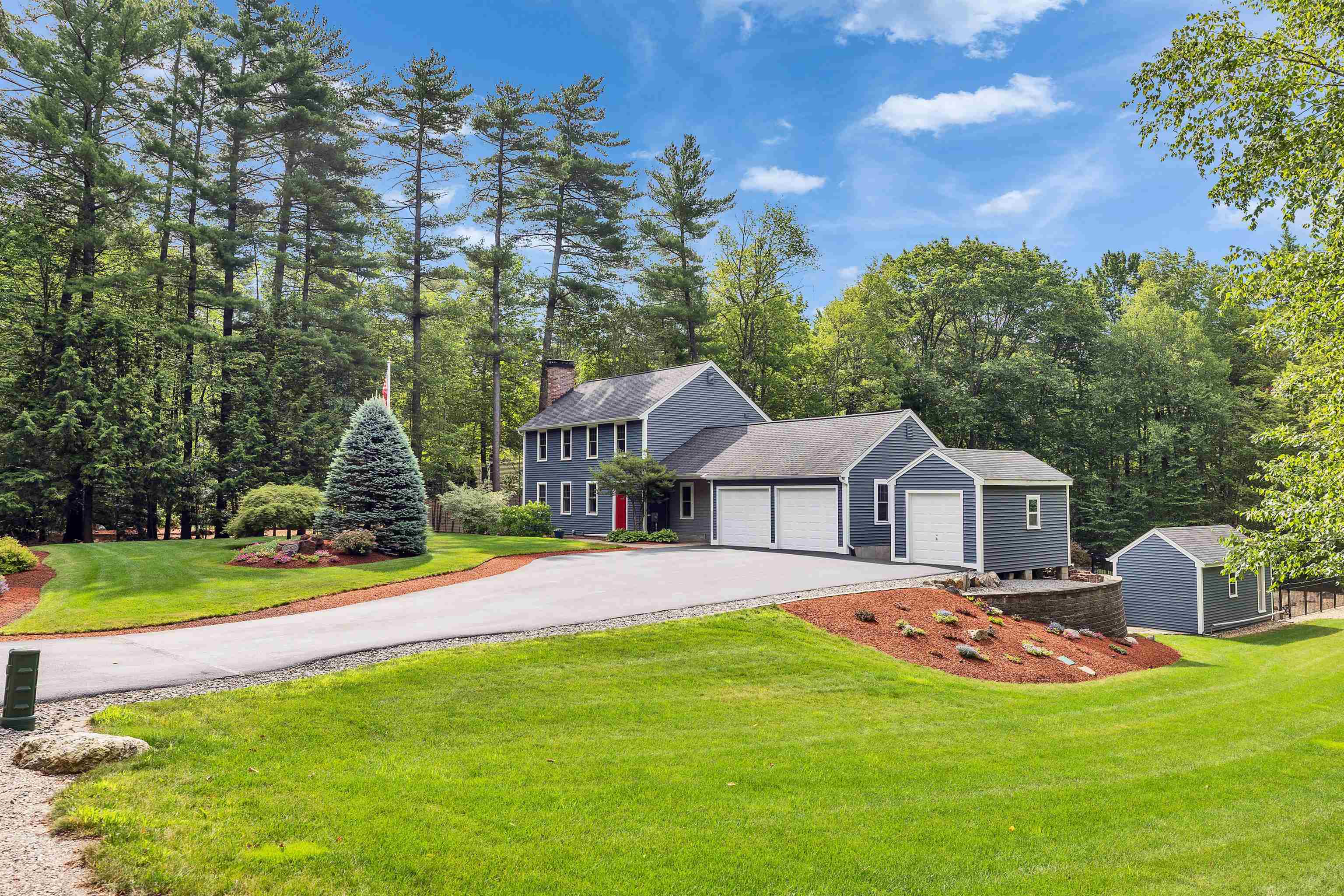 Property Photo:  66 Cambridge Road  NH 03110 