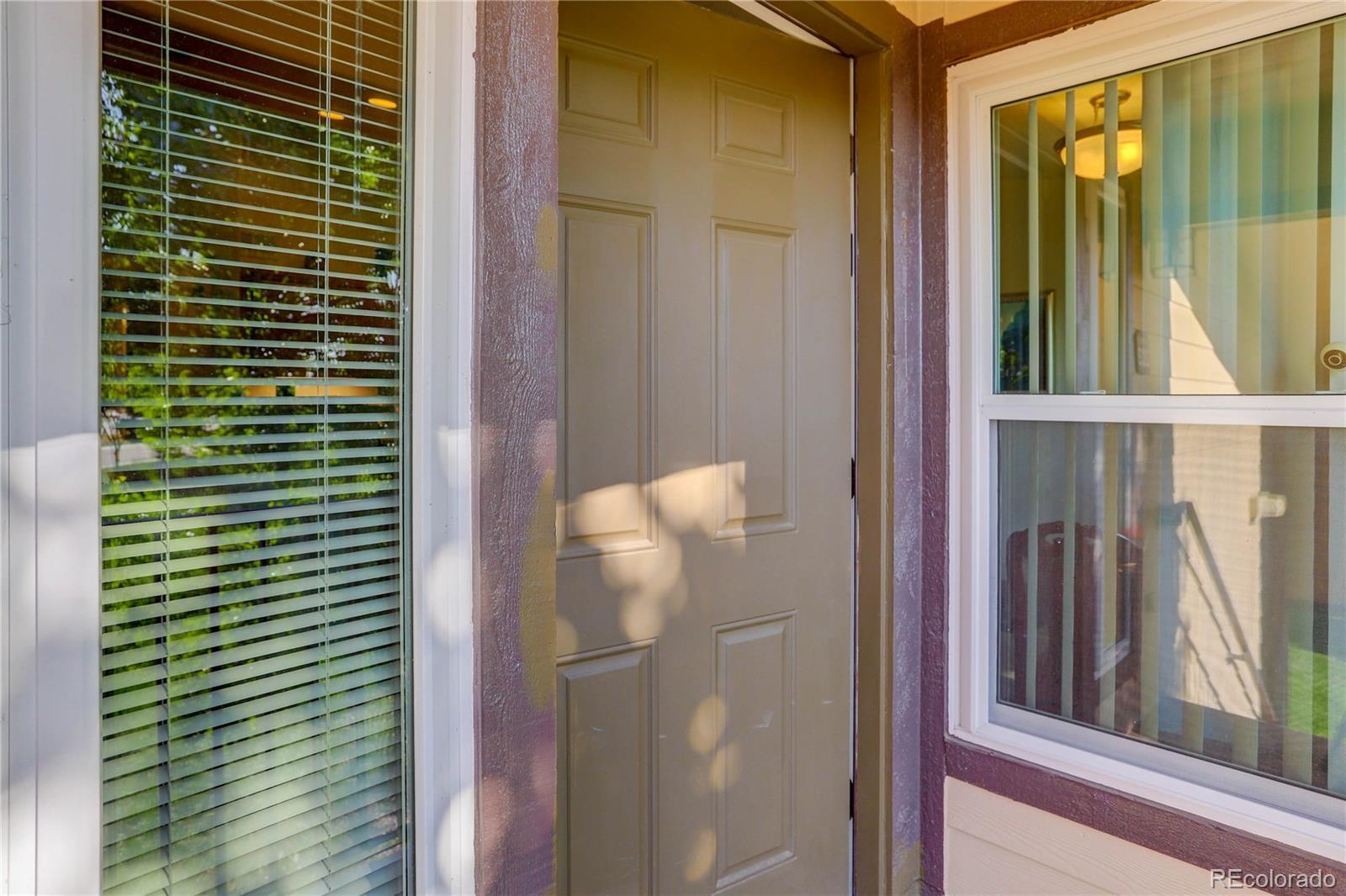 Property Photo: 4875 S Balsam Way 8-203 CO 80123