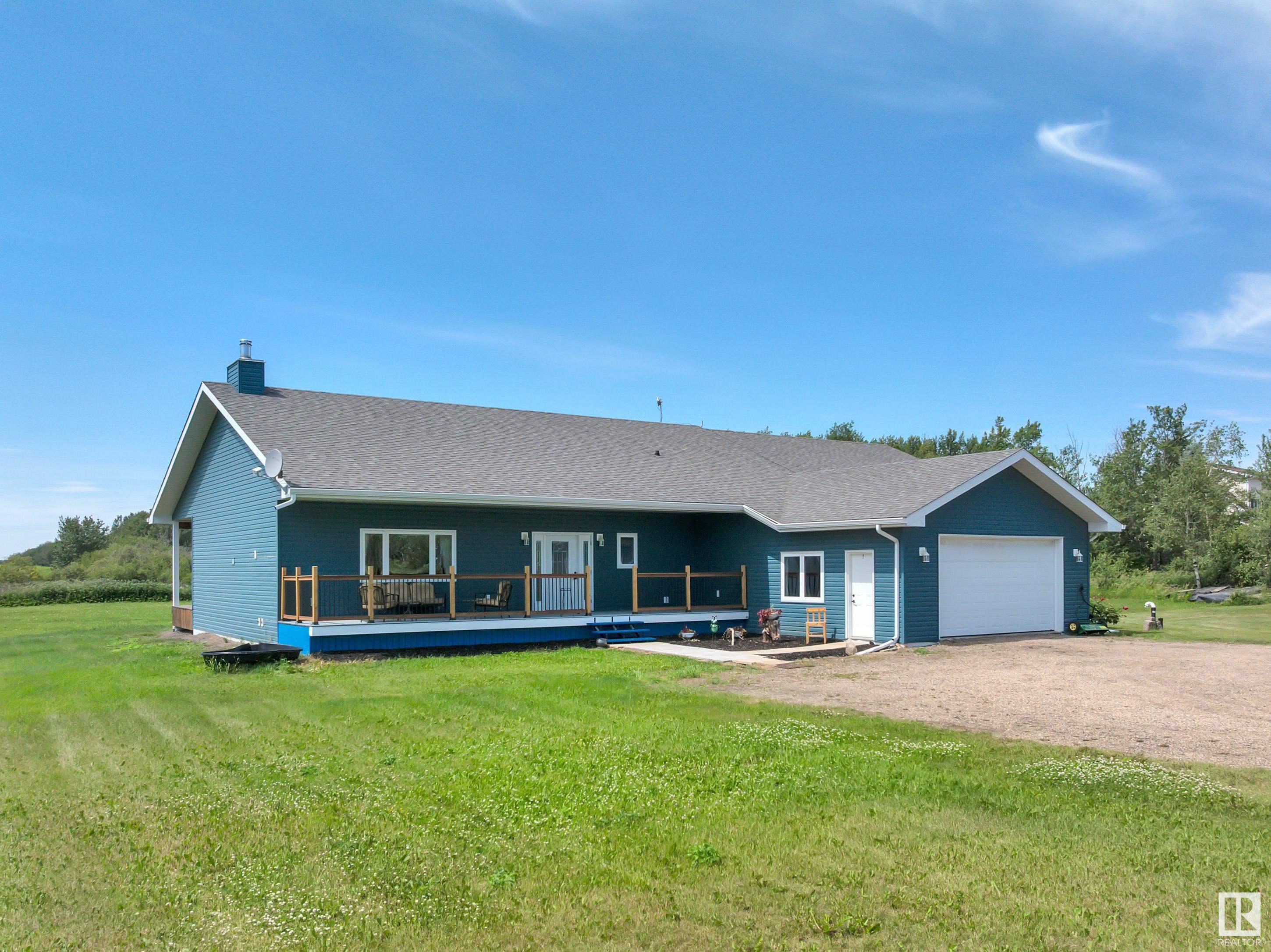 Property Photo: 56032 Rge Road 241 AB T0A 0K0