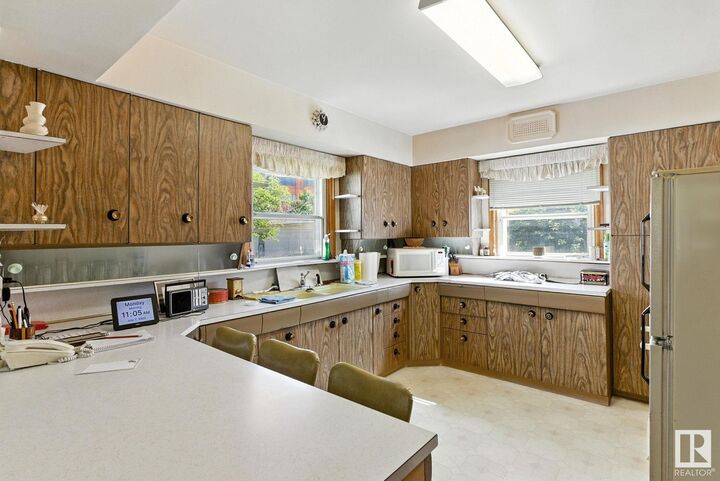 Property Photo:  11033 107 Street NW  AB T5H 2Z6 
