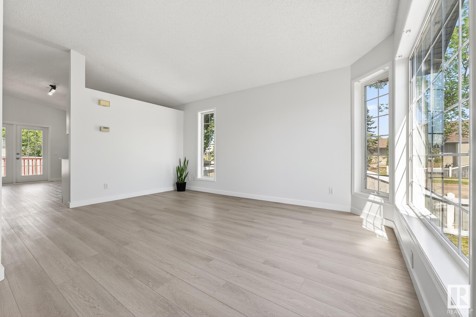 Property Photo:  11453 9 Avenue NW  AB T6J 6X8 