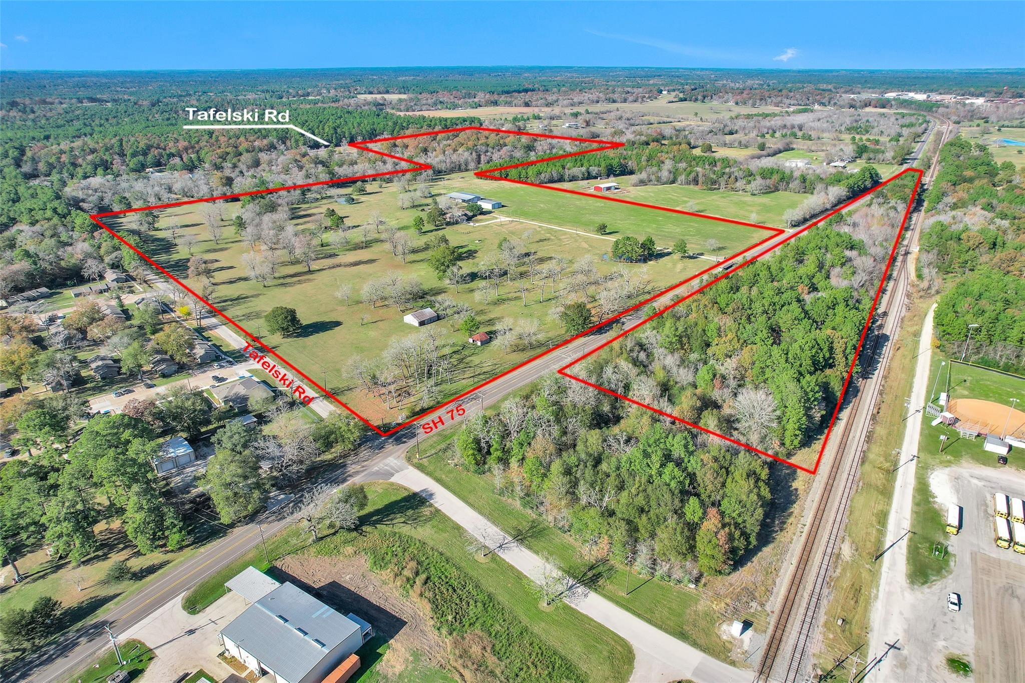 Property Photo: 9192 Sh 75 S Highway S TX 77358