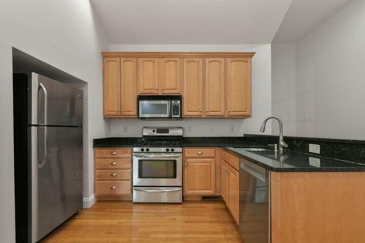 Property Photo: 183 L St 1 MA 02127