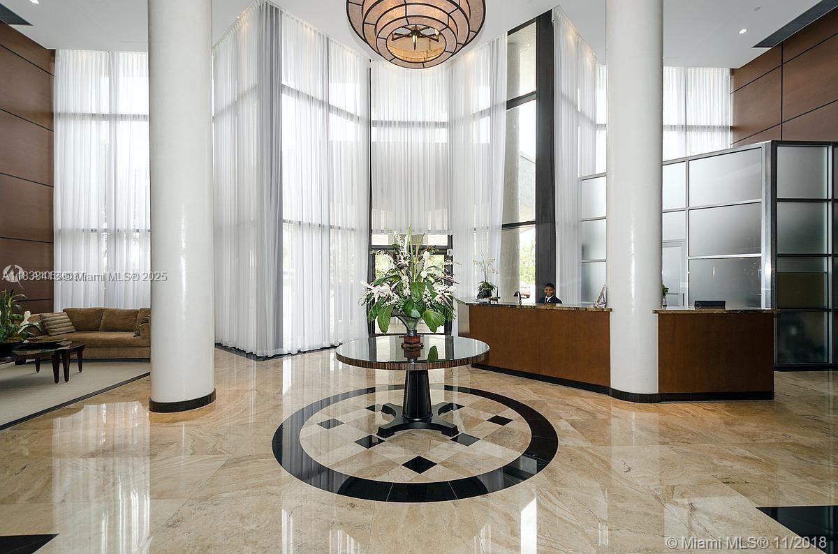 Property Photo:  300 Three Islands Blvd 308  FL 33009 