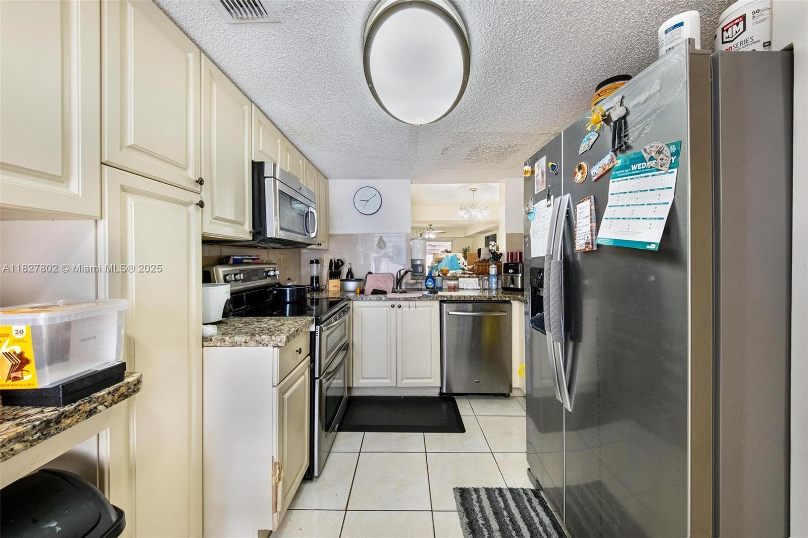 Property Photo:  1178 NW 123rd Pl 1210  FL 33182 