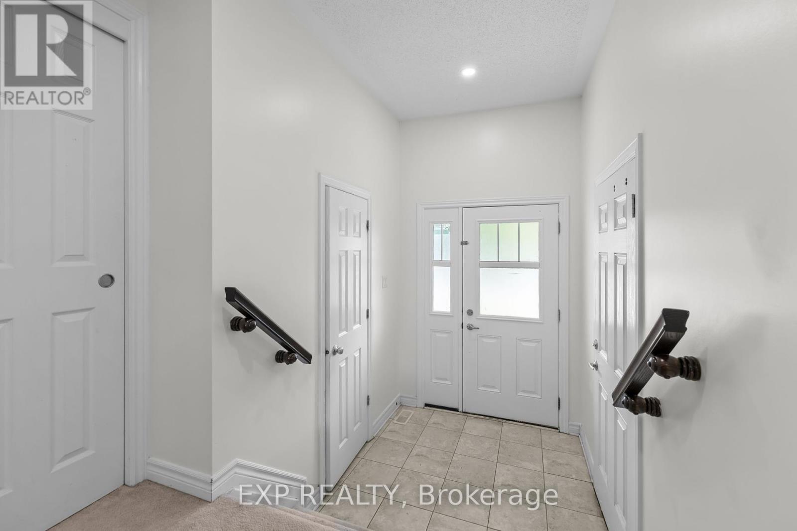 Property Photo: 213 Mancini Way ON K2J 3V1