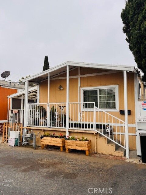 Property Photo: 15325 Orange Ave, D8 CA 90723