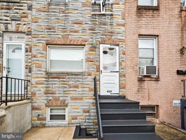 Property Photo: 419 W 23rd Street MD 21211