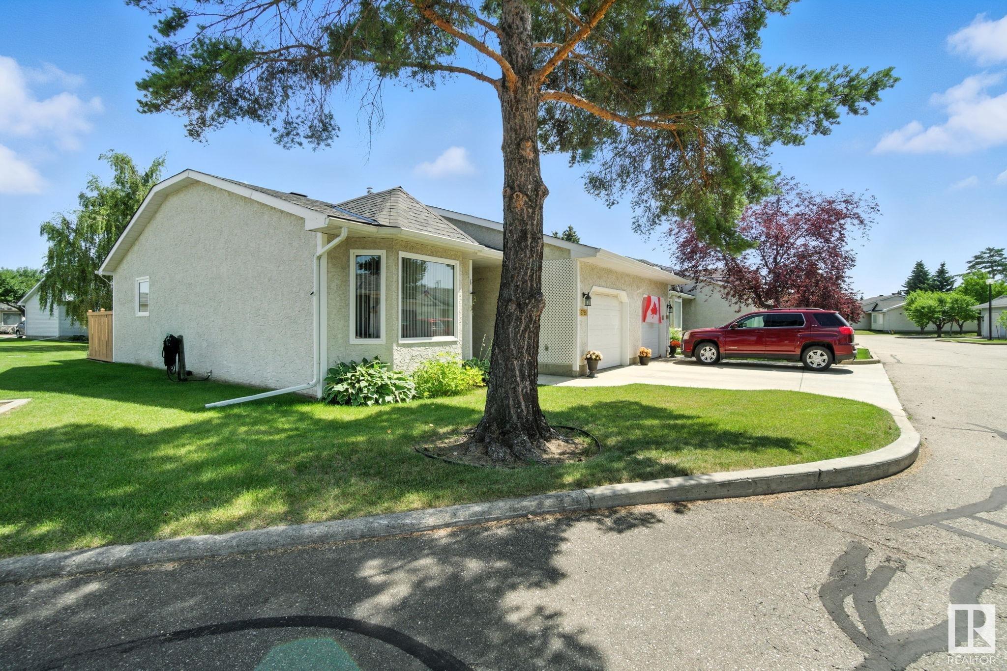 Property Photo: 5785 189 Street NW AB T6M 2G9