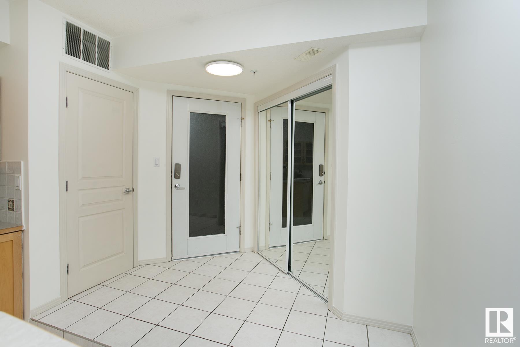 Property Photo: 11025 83 Avenue NW 103 AB T5J 5G3
