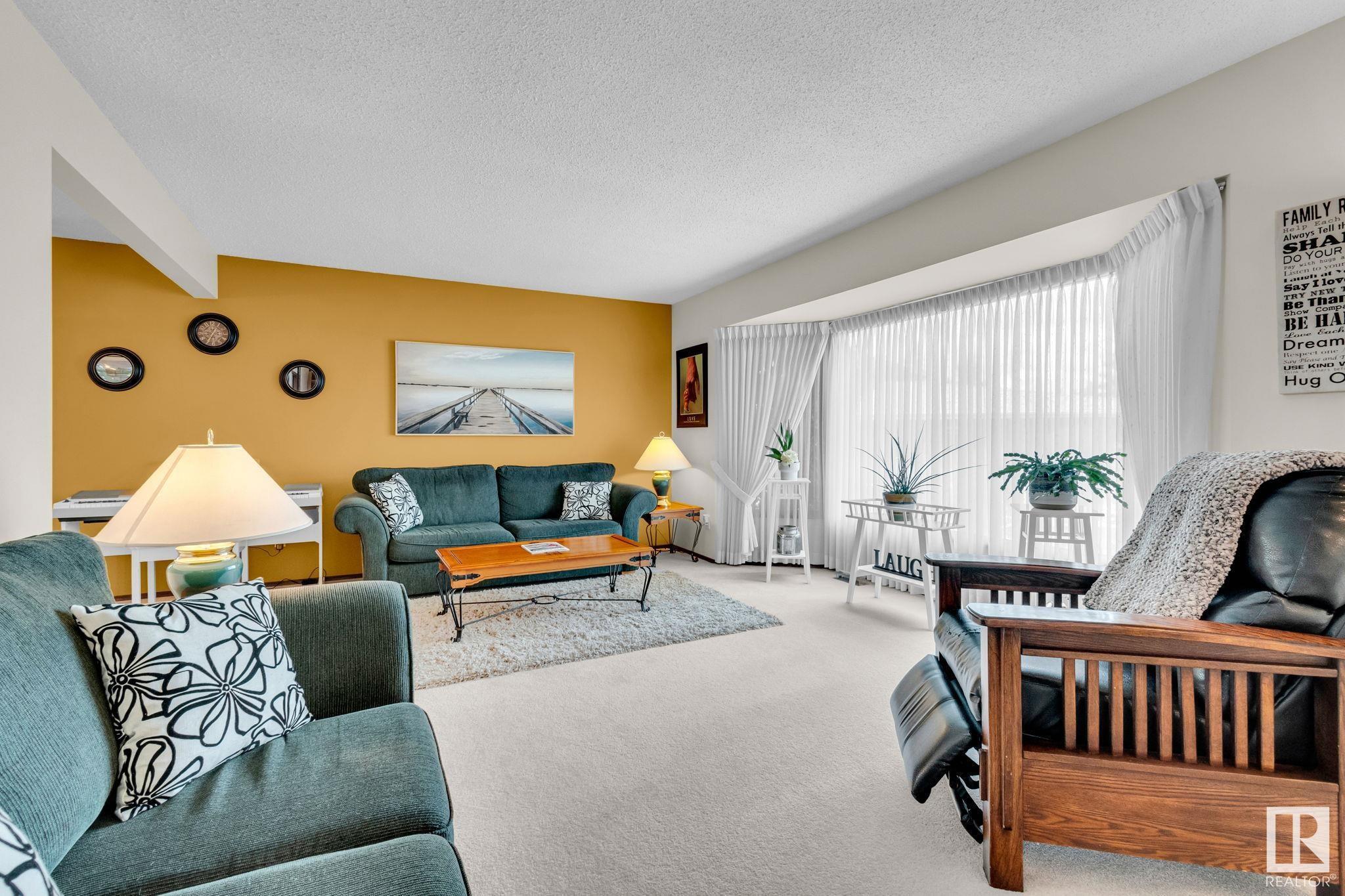 Property Photo: 11739 27 Avenue NW AB T6J 3N7