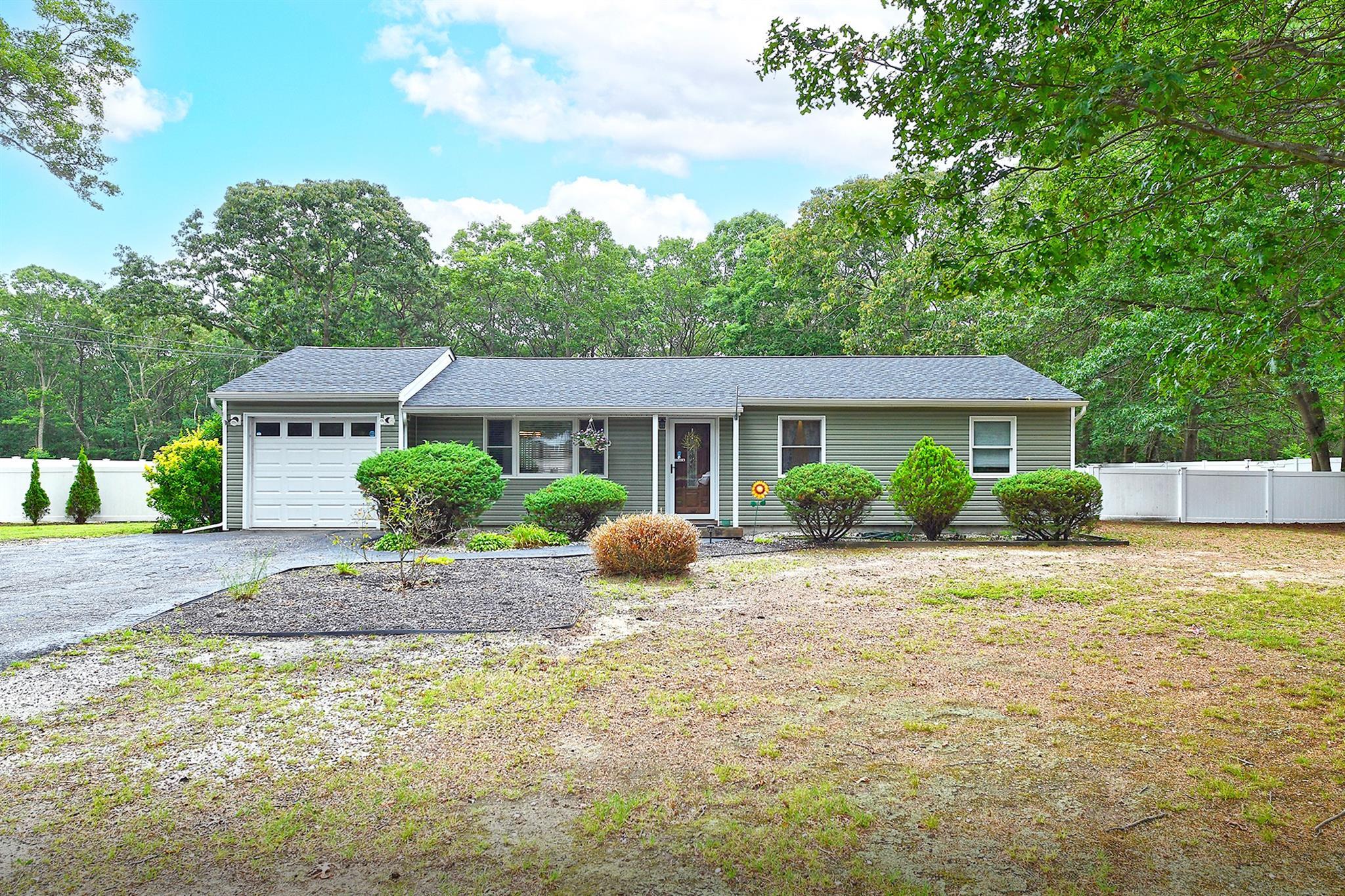 Property Photo: 152 E Woodside Avenue NY 11772