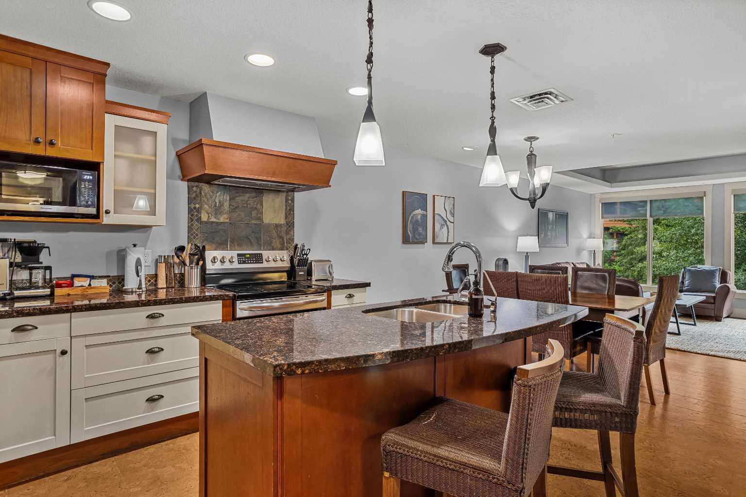 Property Photo:  187 Kananaskis Way 213  AB T1W 0A3 