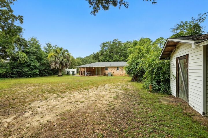 Property Photo:  5746 Jones Street  FL 32570 
