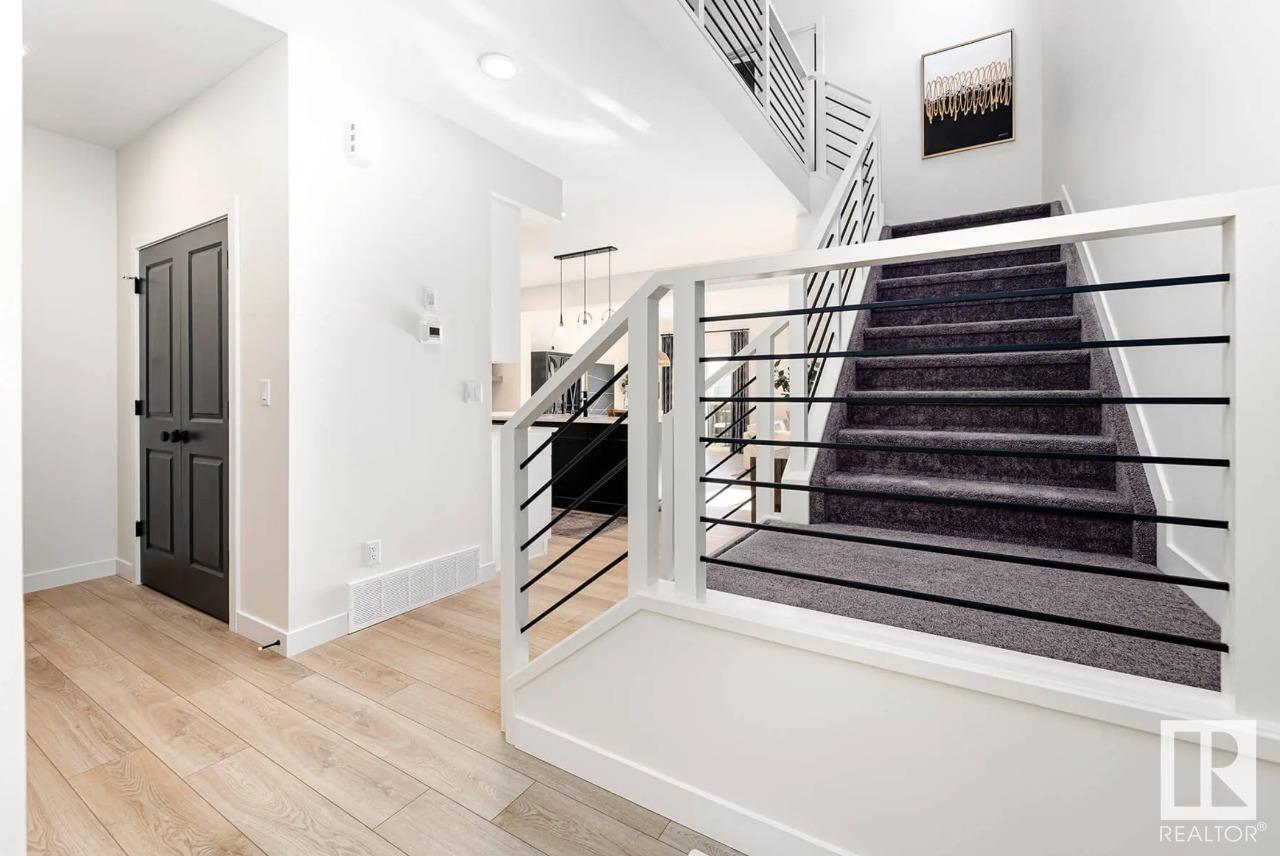 Property Photo:  8821 223A Avenue NW  AB T5T 7X2 