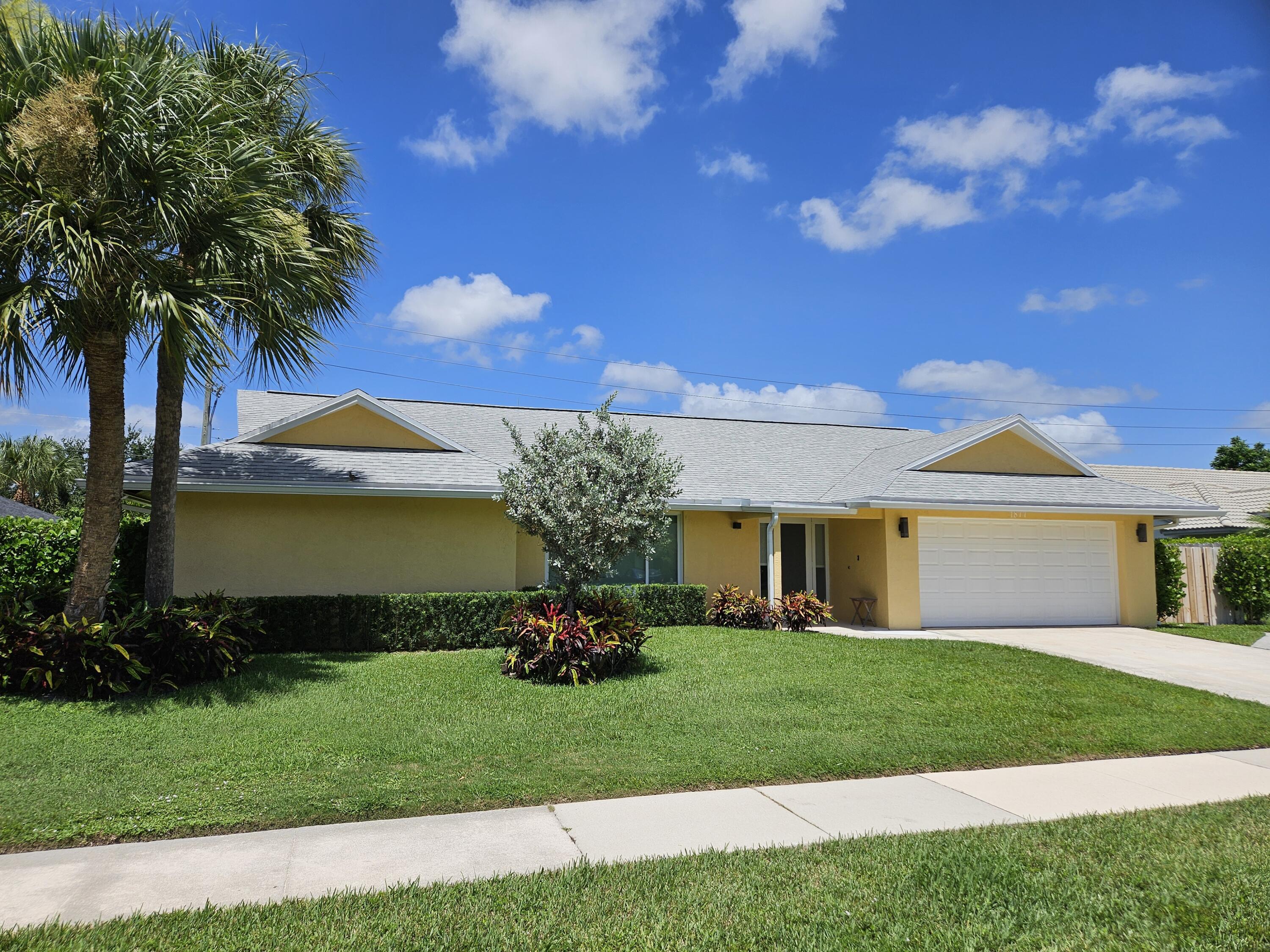 Property Photo:  1877 Shower Tree Way  FL 33414 