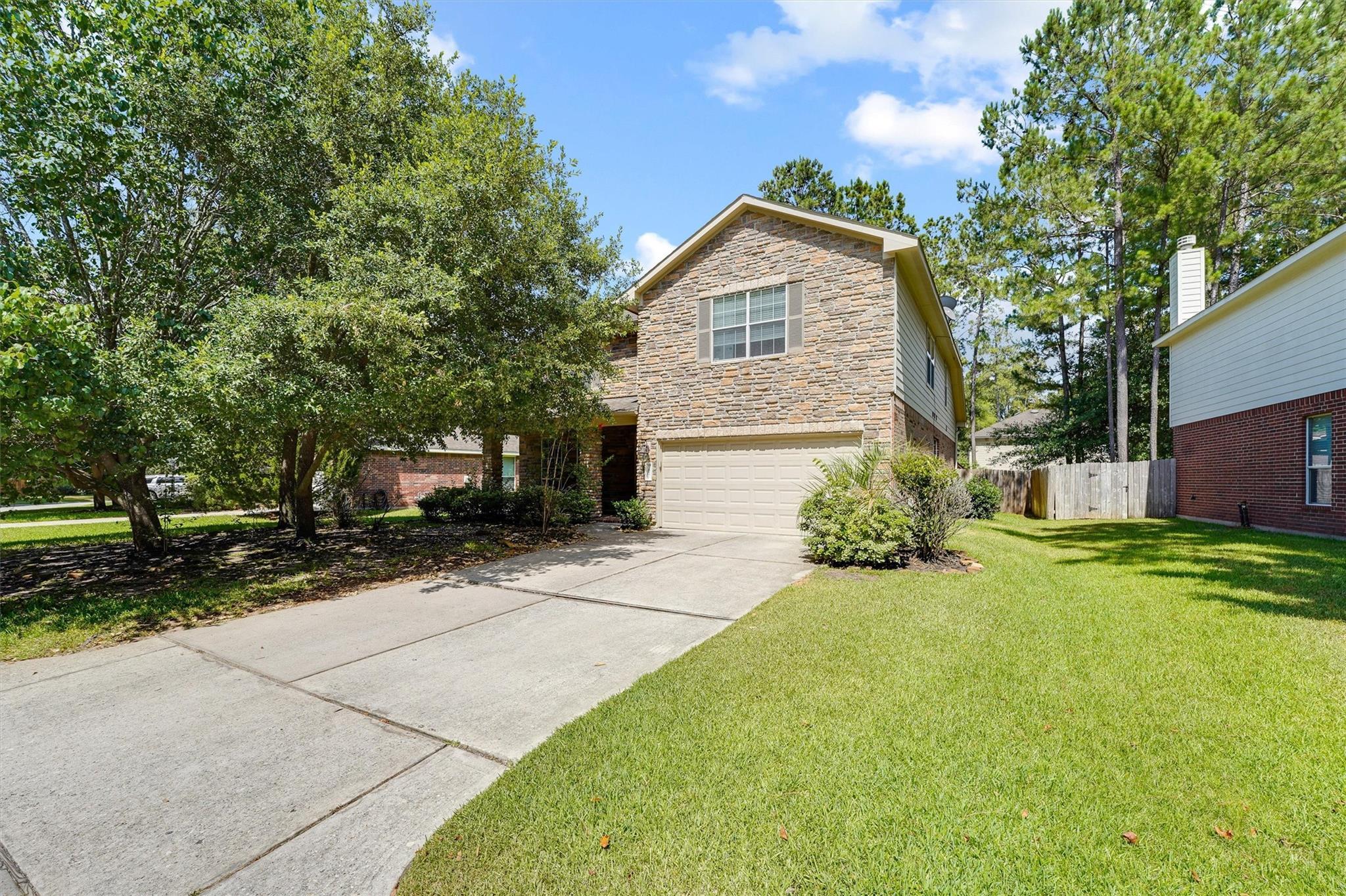 Property Photo:  62 N Planchard Circle  TX 77382 