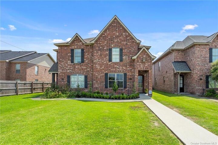 Property Photo: 1550 Lacadie Drive 11 LA 70605
