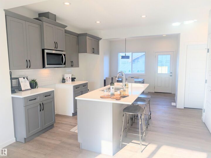 Property Photo:  92 Dansereau Way  AB T4X 3E2 