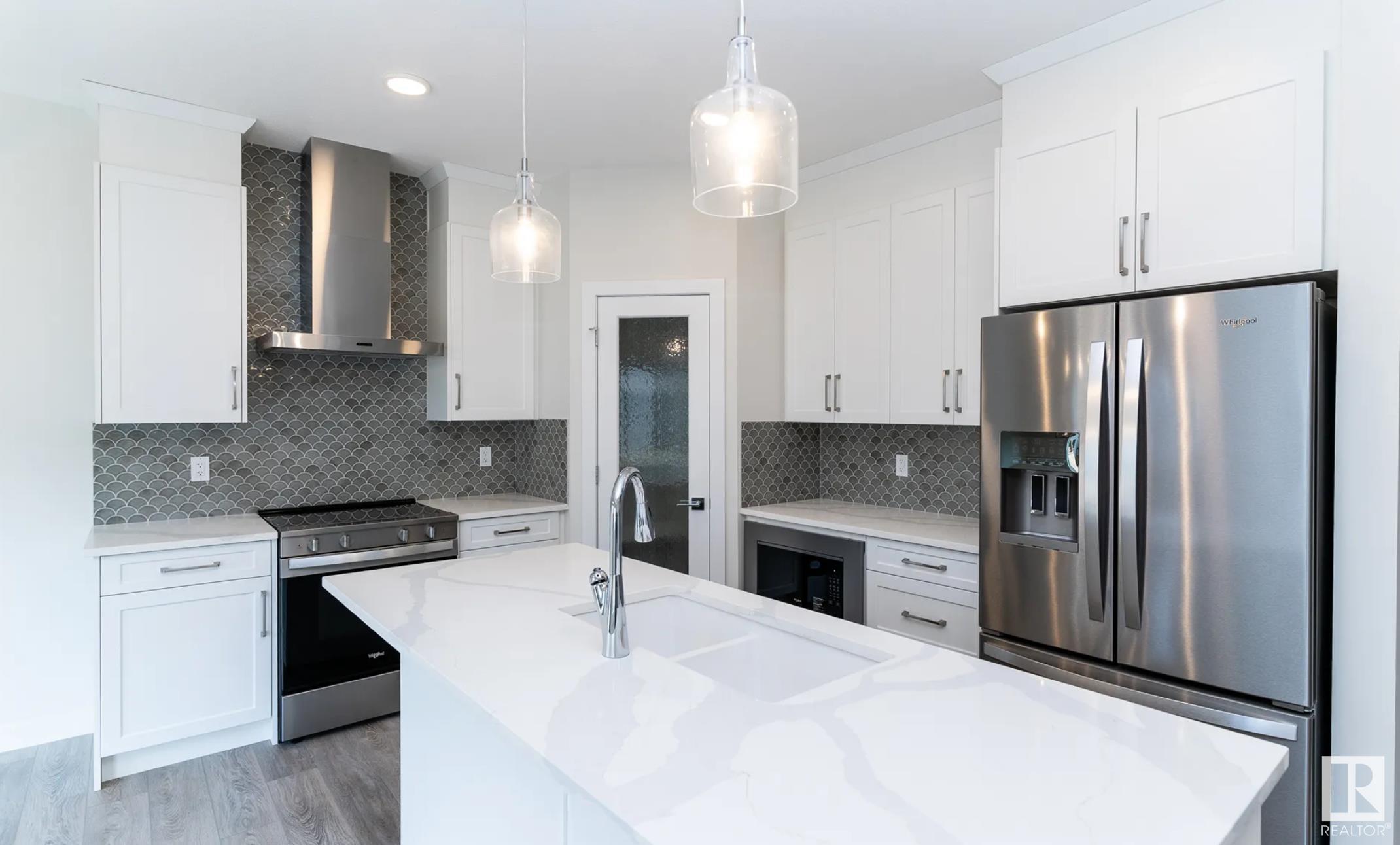 Property Photo: 3216 Dixon Way SW AB T6W 5L3