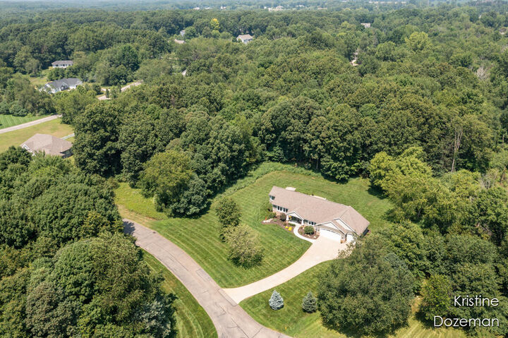 Property Photo:  8891 O'Neal Woods Court SE  MI 49302 