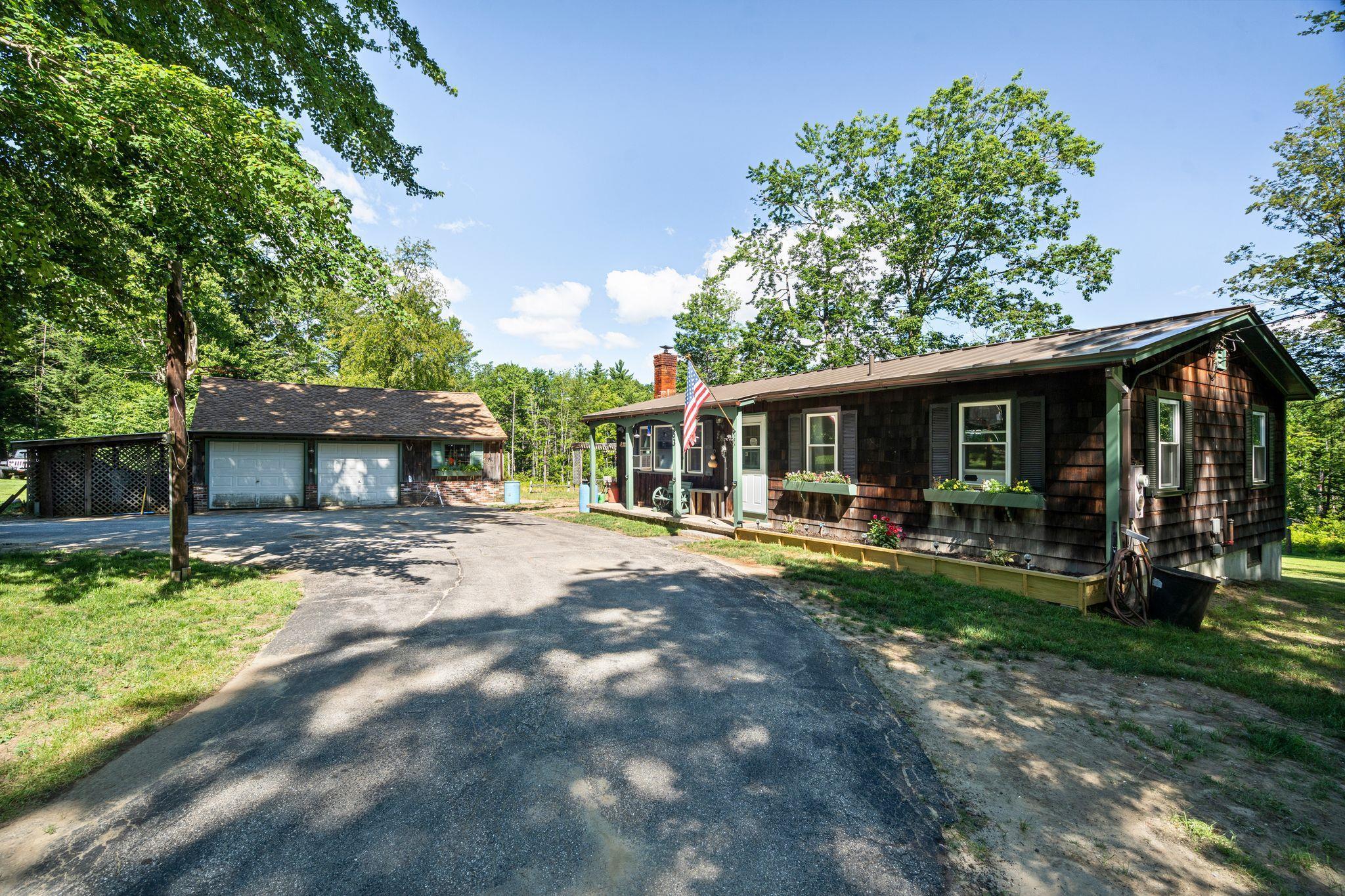 Property Photo: 63 Zephyr Lake Road NH 03047