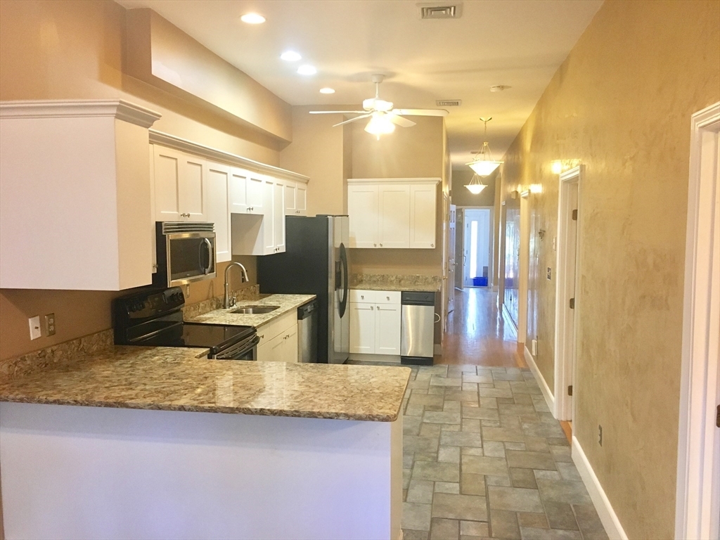 Property Photo: 617 E 3rd St 1 MA 02127