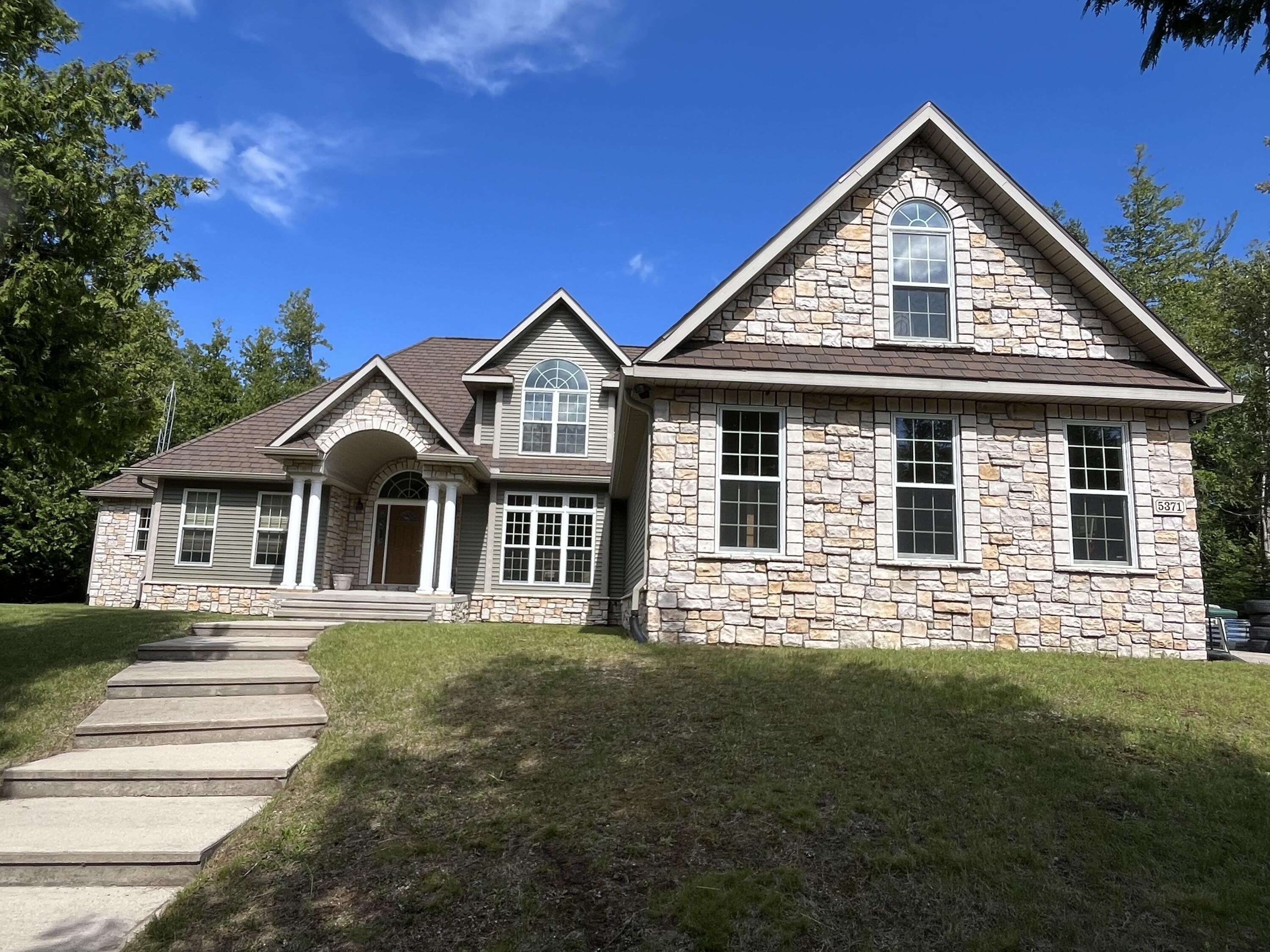 Property Photo:  5371 Cedar Wood Road  MI 49777 