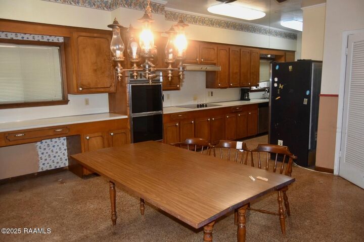Property Photo:  303 Colonial Drive  LA 70506 