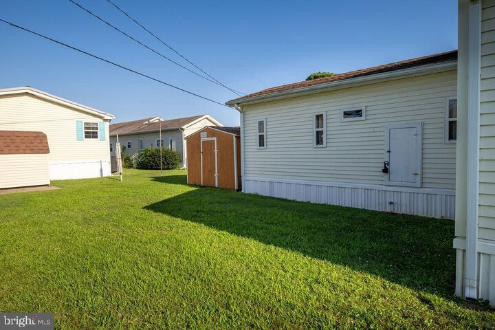 Property Photo:  21791 C St 4065  DE 19971 