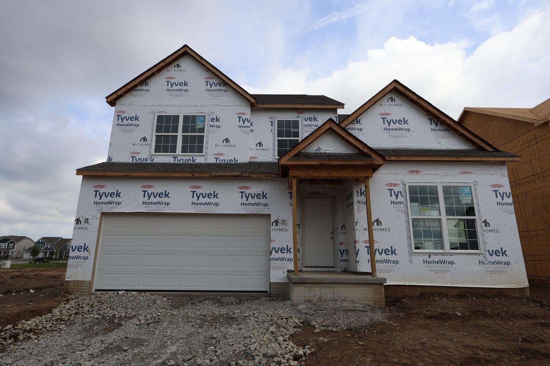 Property Photo: 7044 Sanctuary NW Drive OH 43147