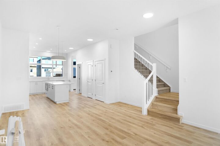 Property Photo:  5115 Parc Reunis Way  AB T4X 3E6 