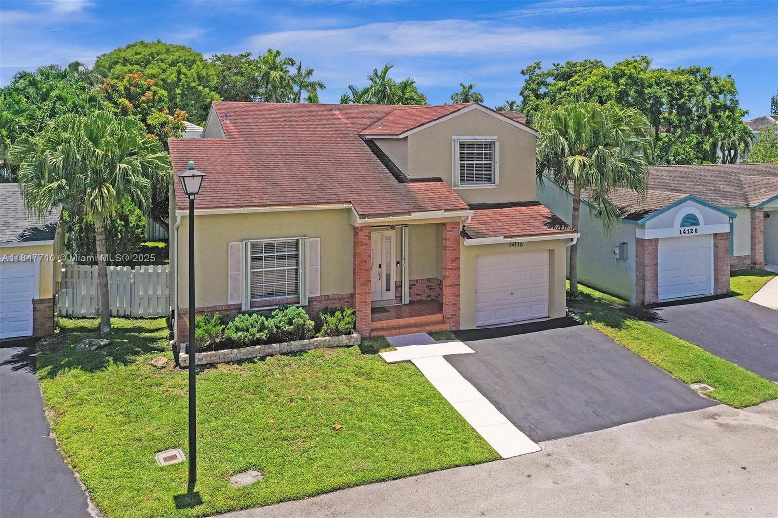 Property Photo: 14116 Langley Pl FL 33325