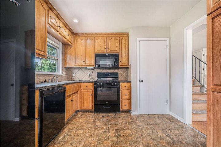 Property Photo:  1603 NE 63rd Street  MO 64118 