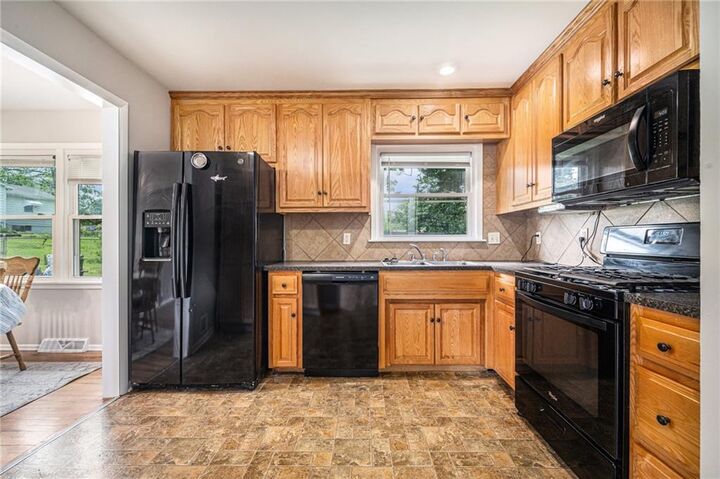 Property Photo:  1603 NE 63rd Street  MO 64118