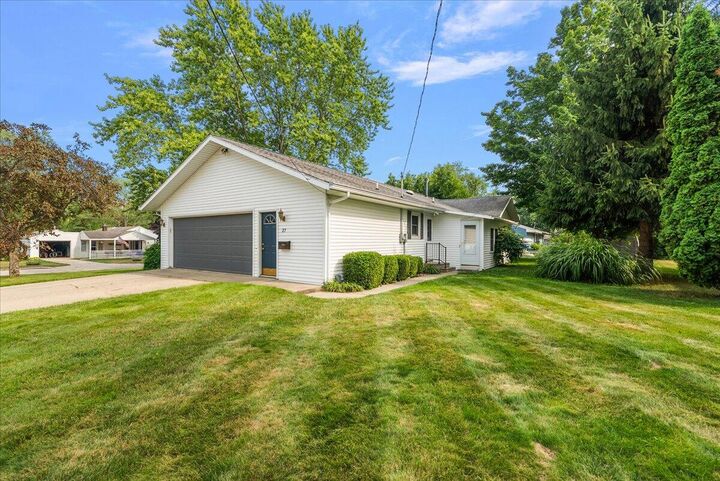 Property Photo:  27 N Peach Street  MI 49420 