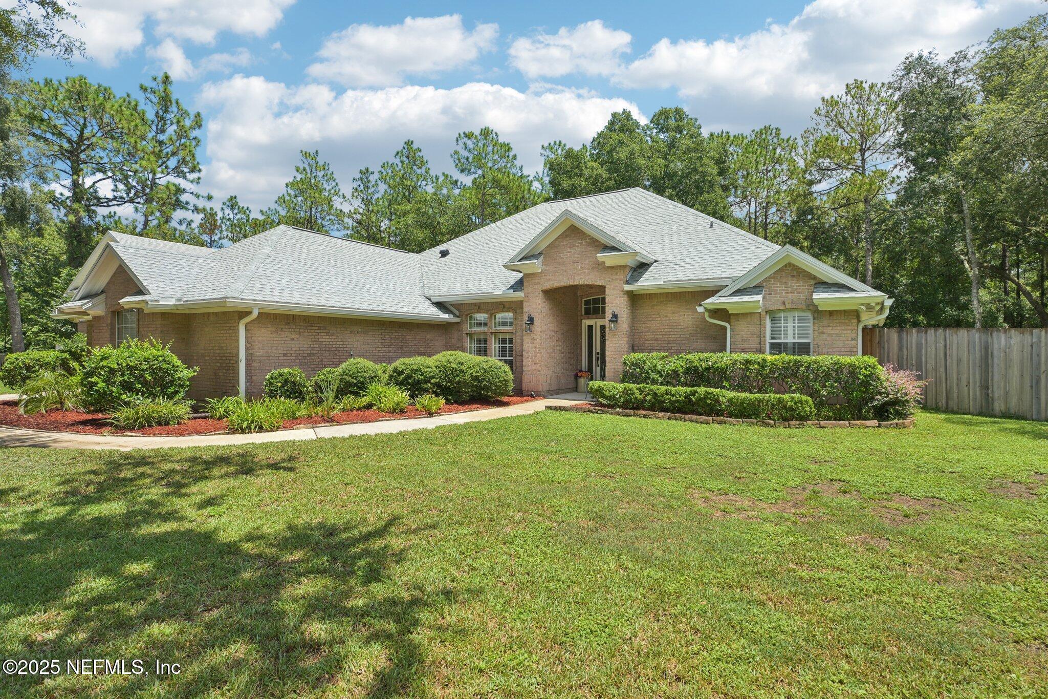 Property Photo: 1221 Creekwood Way S FL 32259