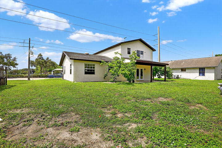 Property Photo:  565 SE Port St Lucie Boulevard  FL 34984 