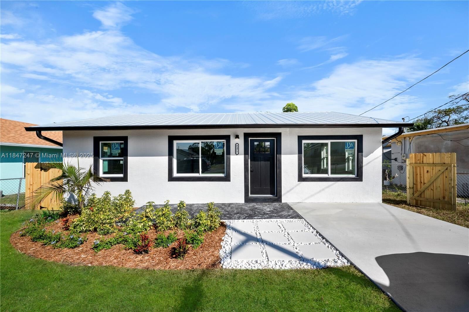 Property Photo:  8477 SE Begonia Way  FL 33455