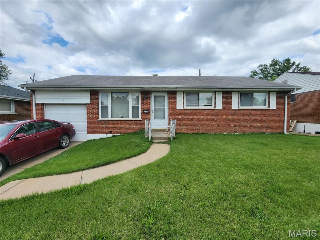 Property Photo: 9340 Bellefontaine Road MO 63137