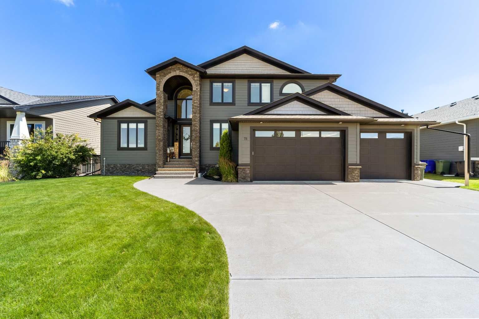 Property Photo: 71 Harrison Green AB T4H 1W2