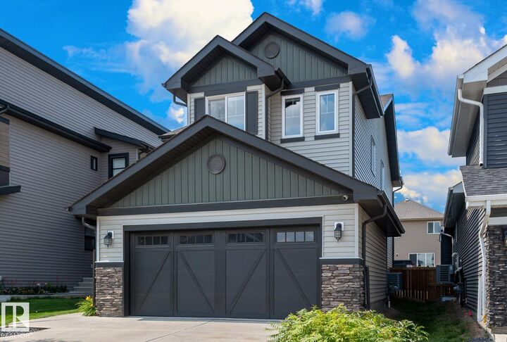 Property Photo:  9720 223 Street NW  AB T5T 7B7 