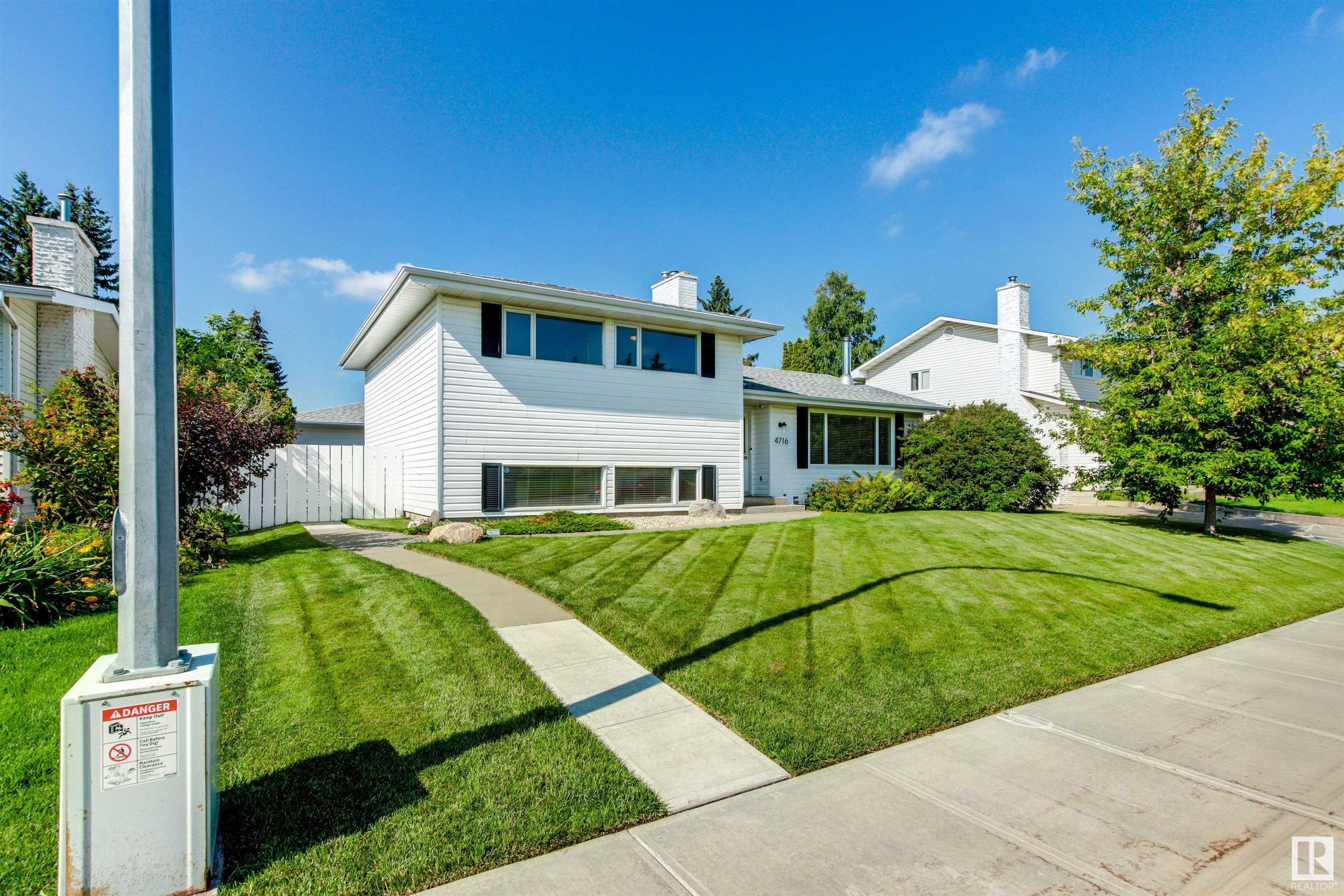 Property Photo: 4716 124 Street NW AB T6H 3T8