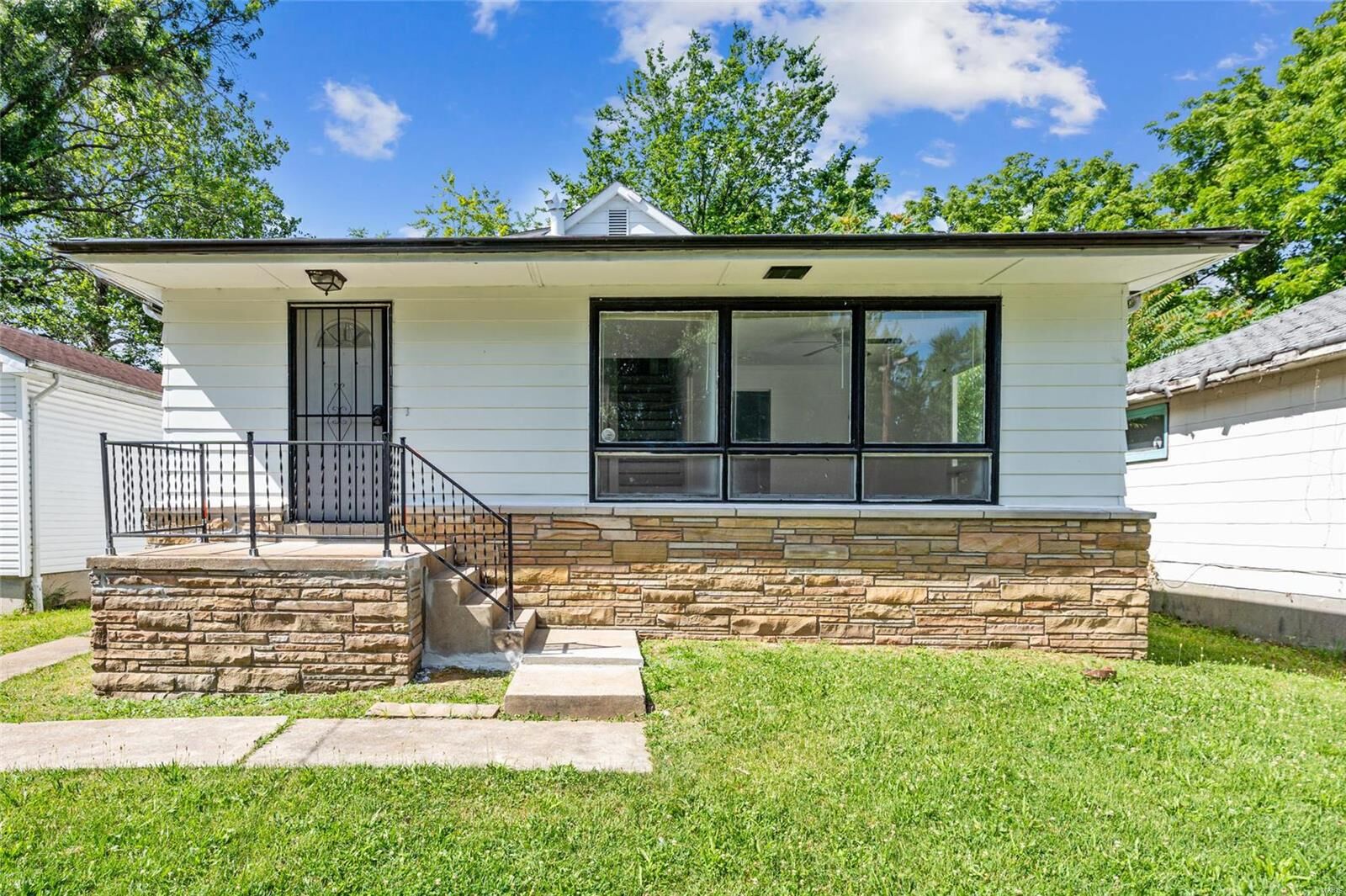 Property Photo: 7214 Harney Avenue MO 63136