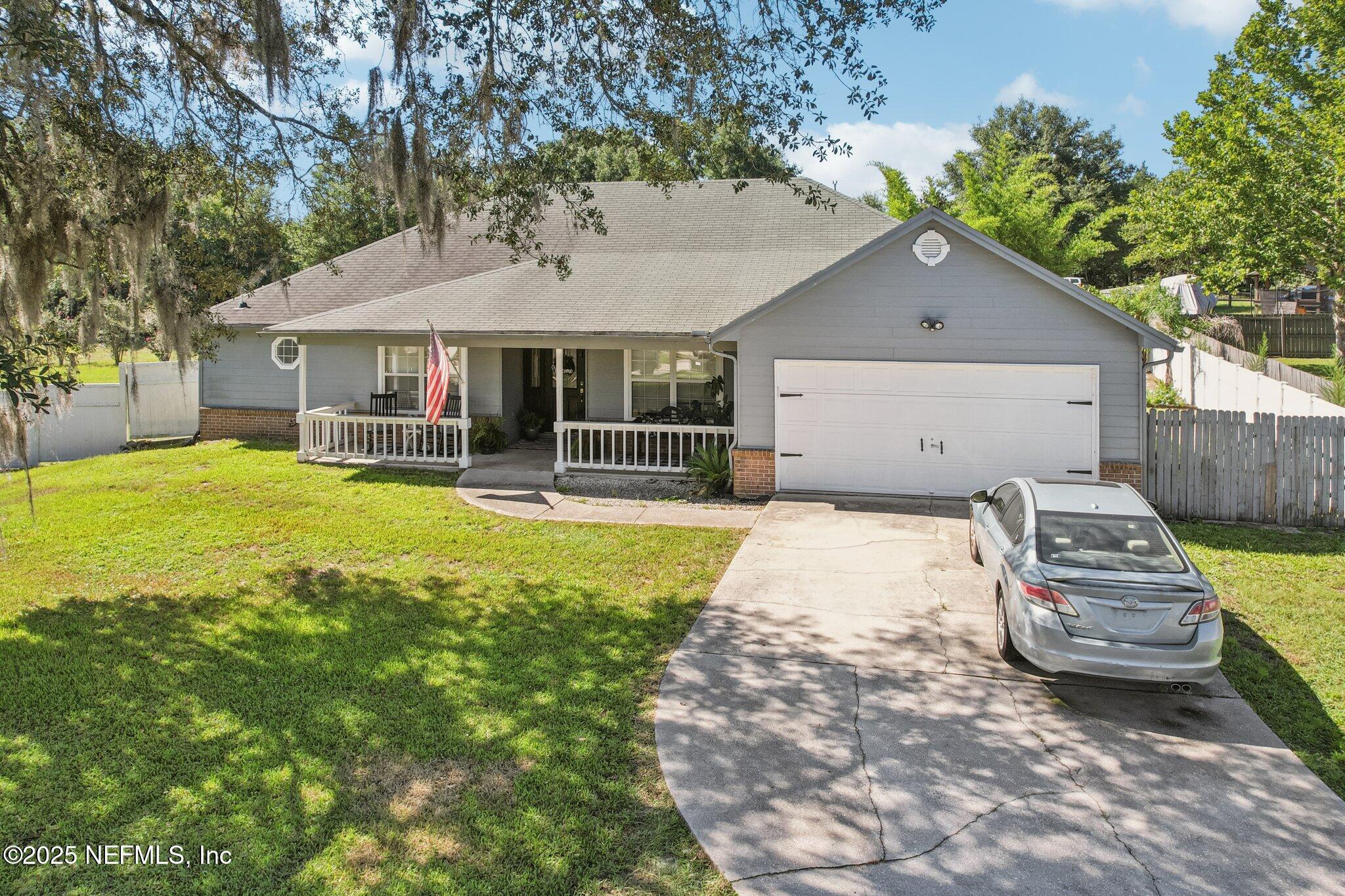 Property Photo: 4459 Eli Whitney Drive FL 32068