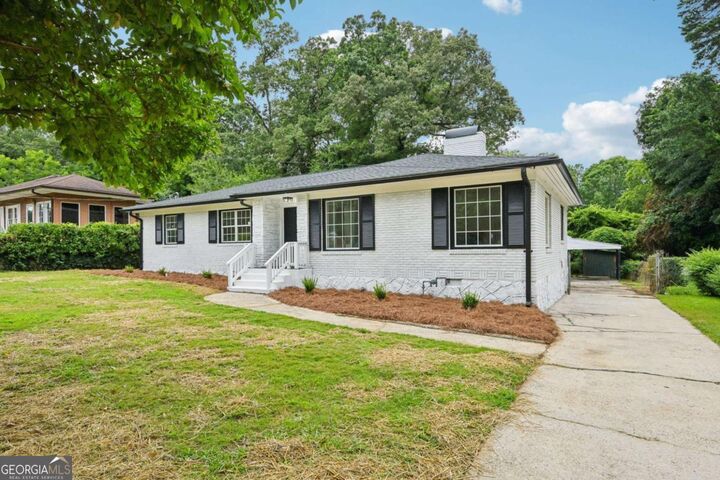 Property Photo: 1343 Downs Drive SW GA 30311
