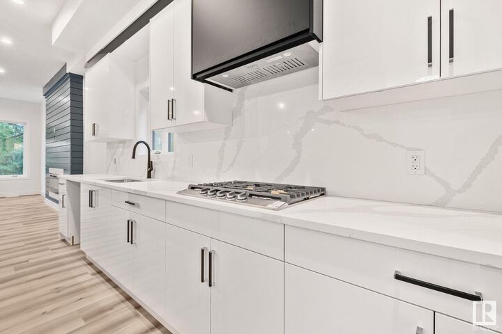 Property Photo:  11032 128 Street NW  AB T5M 0W6 