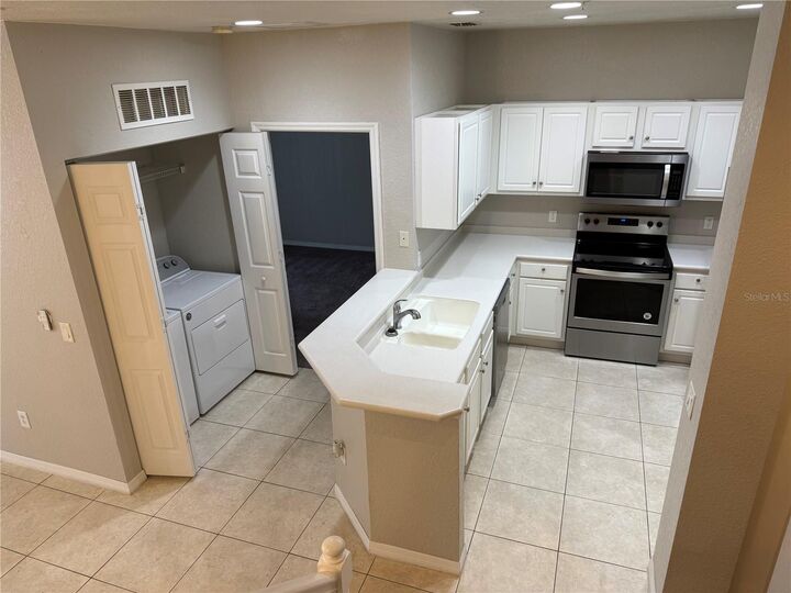 Property Photo: 2586 Grand Central Parkway 13 FL 32839