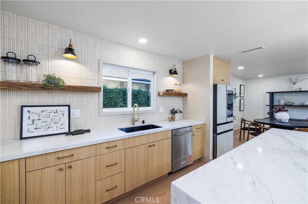 Property Photo:  9792 La Arena Circle  CA 92708 
