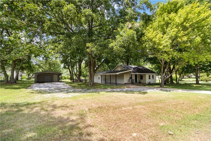 Property Photo:  213 N West Avenue  AR 72744 